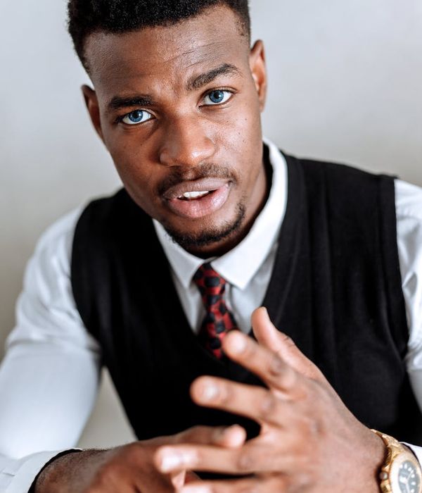 Portrait of a friendly and professional male instructor in his late 30s.